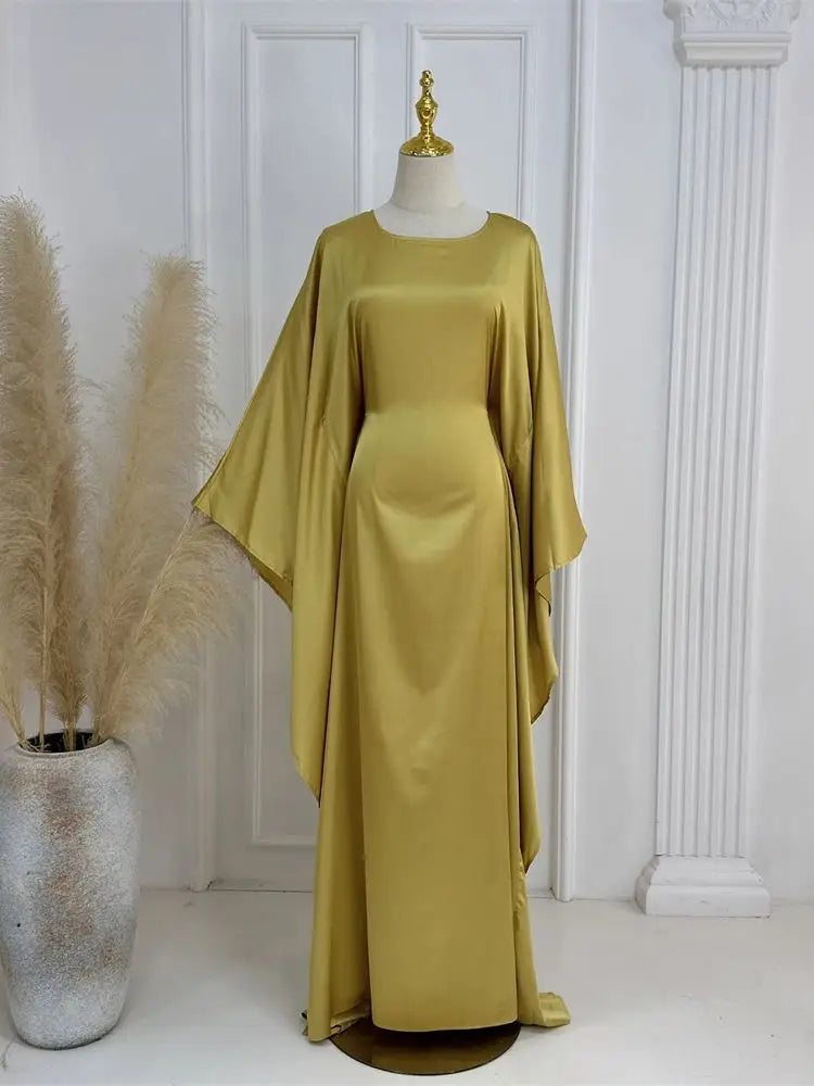 Flattering fit women's elegant maxi dress, featuring delicate spaghetti straps & a sexy high slit.
