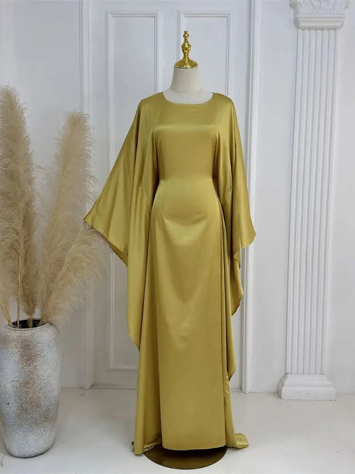 Flattering fit women's elegant maxi dress, featuring delicate spaghetti straps & a sexy high slit.