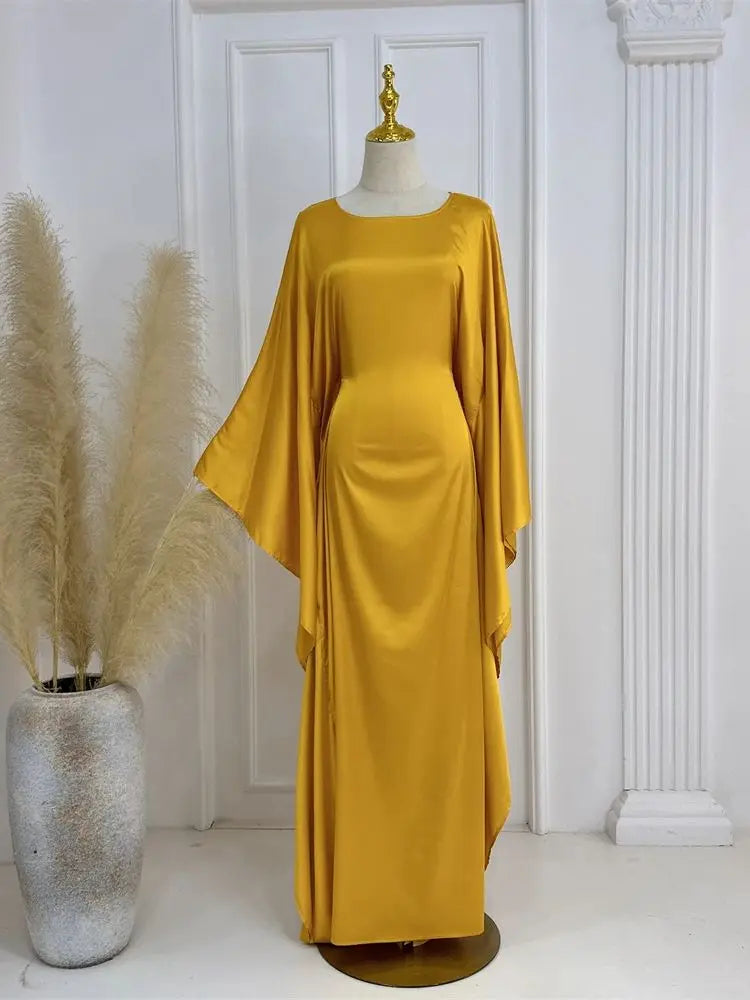 Vibrant women's special occasion dress: spaghetti strap maxi with a high slit & elegant design.
