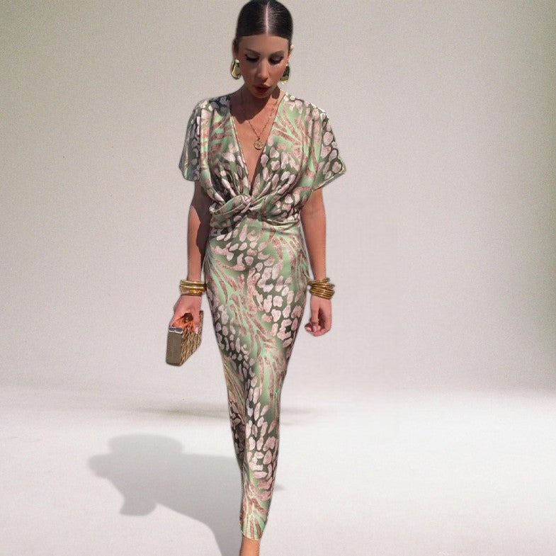 Elegant women's maxi dress with unique V-neck design, perfect for evening wear or special occasions.