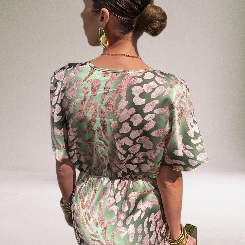 Stylish women's elegant maxi dress featuring a flattering V-neck, ideal for evening or party wear.