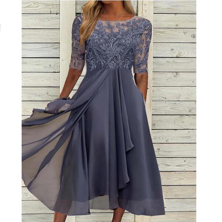 Women's elegant round neck, half sleeve maxi dress. Ideal formal party or evening wear.