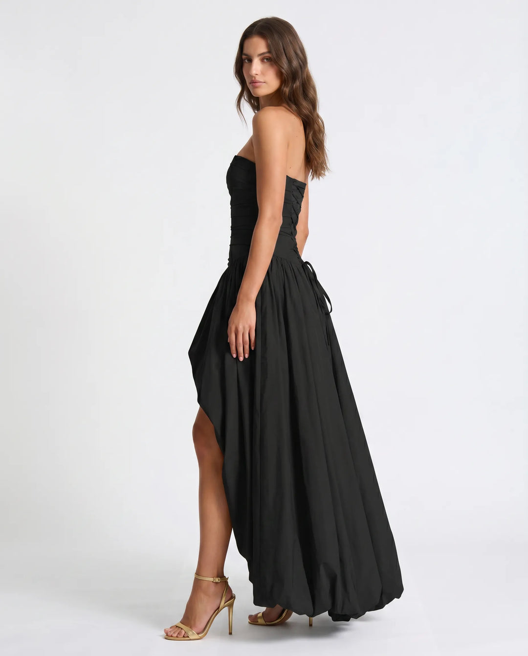 Beautifully draped women's long party dress, an elegant statement gown for memorable occasions.