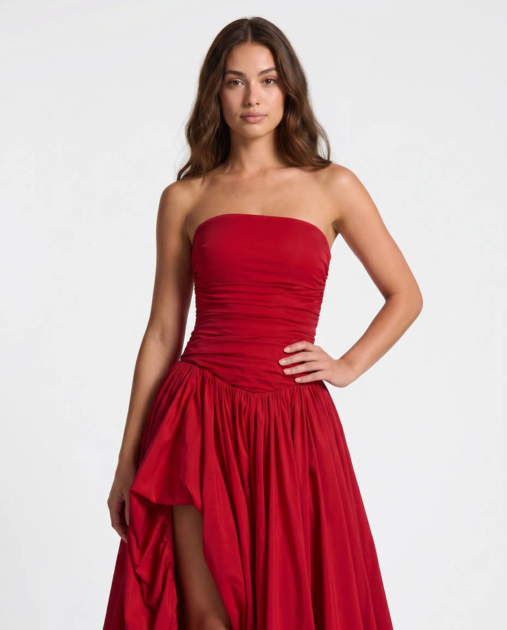 Striking women's statement formal dress, a maxi gown embodying timeless elegance for evening occasions.