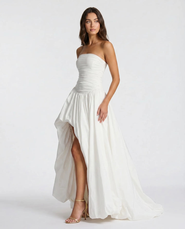 Sophisticated women's evening dress, a flowy maxi gown for a refined party look. Timeless fashion.