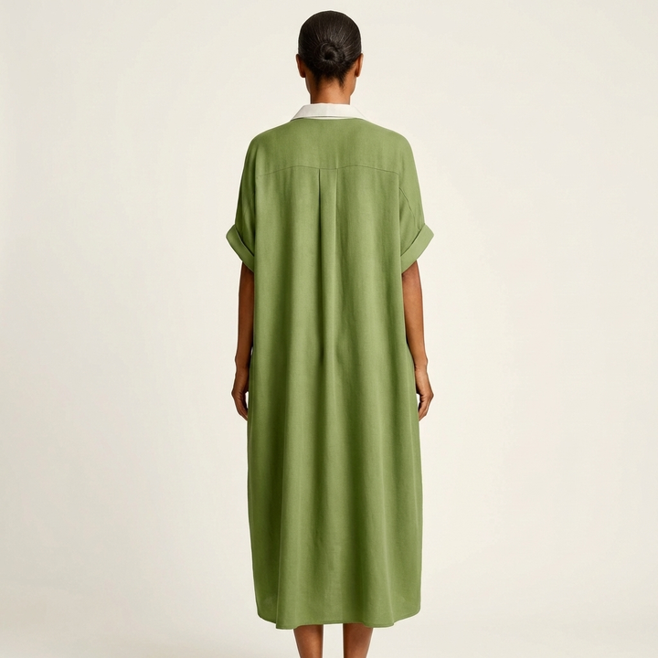 Women's elegant button-front maxi dress. Short sleeves & contrast collar. Versatile for casual or stylish looks.