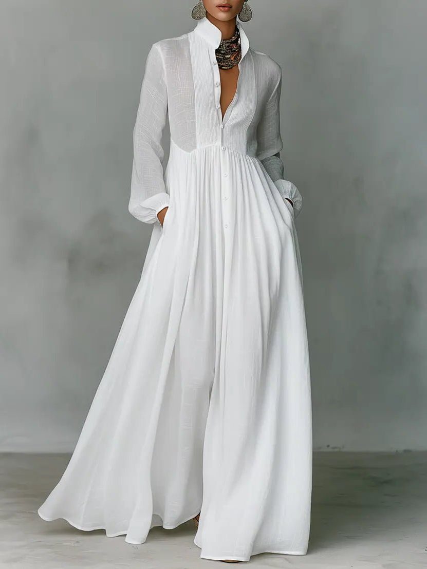 Elegant women's maxi shirt dress with stand collar, button-front, and pockets, perfect for versatile styling.