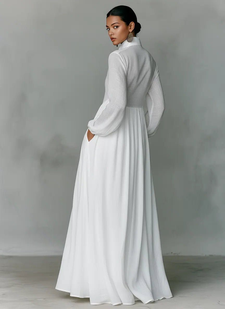 Woman models a chic elegant maxi shirt dress with stand collar and pockets, ideal for spring/summer casual wear.