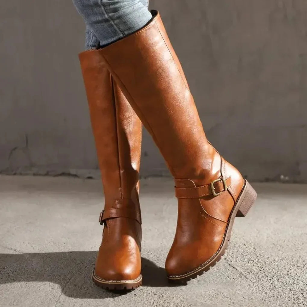 Elegant women's mid-calf boots, classic style for fall & winter. Comfortable, stylish footwear with zipper.