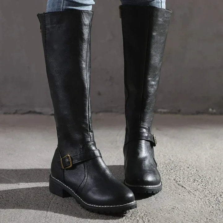 Women's elegant mid-calf boots, featuring classic design for sophisticated fall and winter outfits. Comfortable.