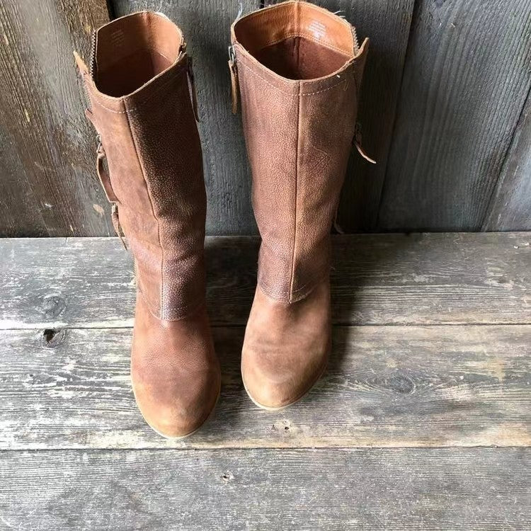 Stylish women's mid-calf boots featuring a convenient side zip & trendy block heel for comfort.