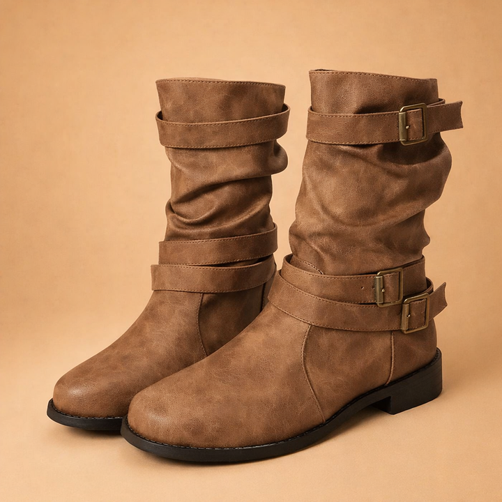 Stylish women's buckle mid-calf boots for winter, offering an elegant and chic look.