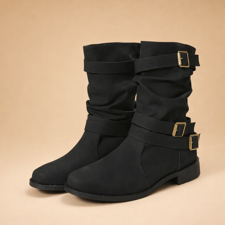 Timeless women's elegant mid-calf boots with a sleek buckle, perfect winter fashion footwear.