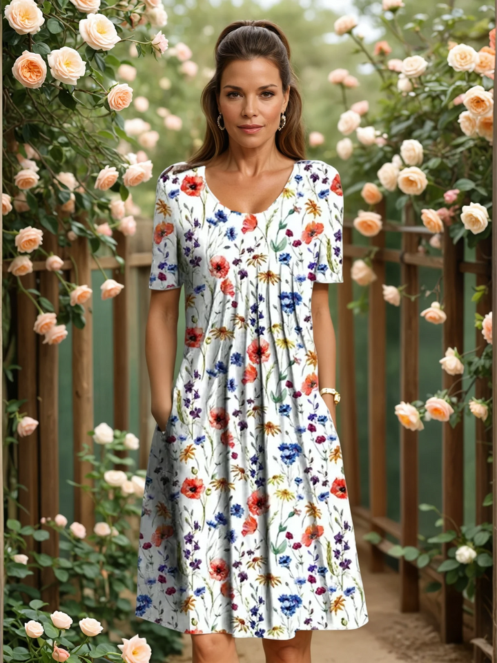 Elegant women's mid-calf floral A-line dress with flattering tummy coverage, perfect for summer casual occasions.