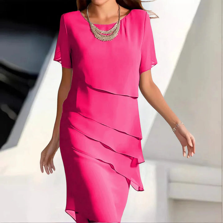 Comfortable and stylish women's midi dress, ideal for everyday wear or elegant summer events.