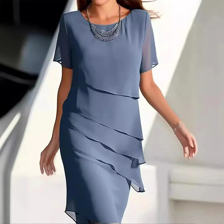 Chic women's midi dress, versatile for a summer party, casual day out, or sophisticated fashion.
