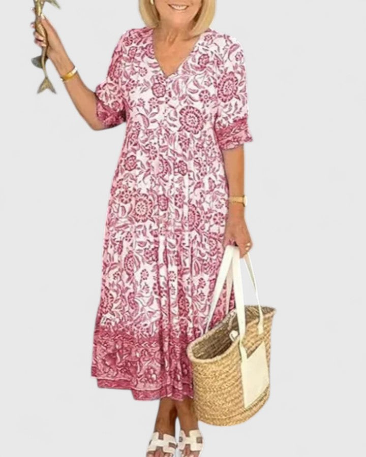 Chic pink women's midi dress featuring a flattering v-neck and half sleeves, ideal for casual or party wear.
