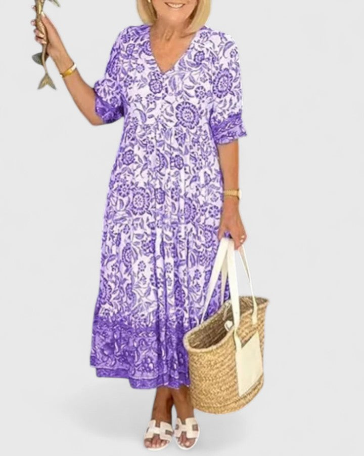 Flattering beige women's midi dress, elegant with a v-neck and half sleeves, offering chic summer fashion.