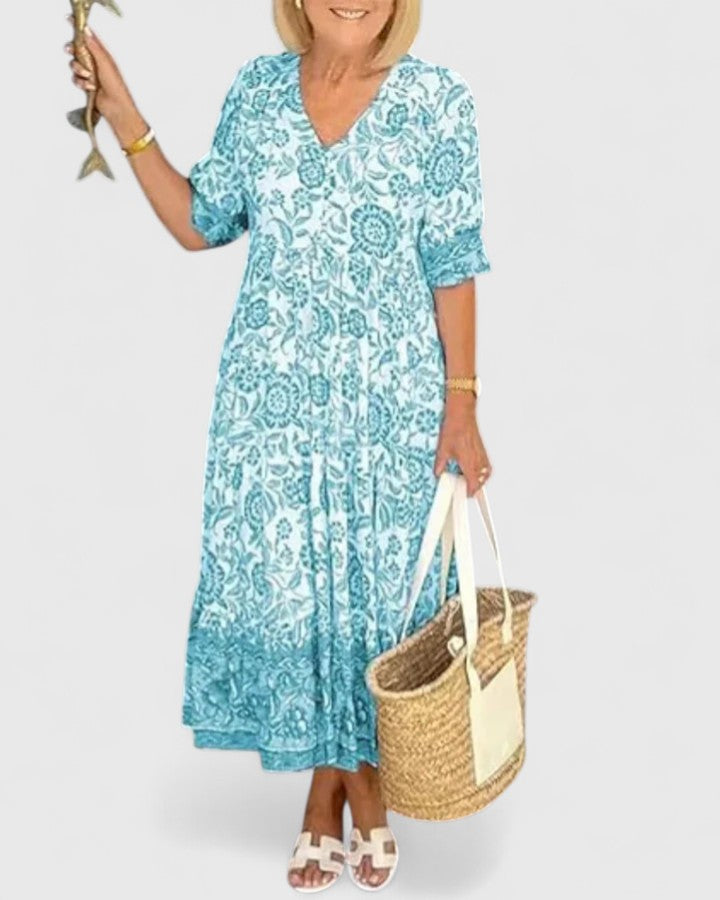 Light blue midi dress for women, an elegant and chic style with a v-neck and comfortable half sleeves.