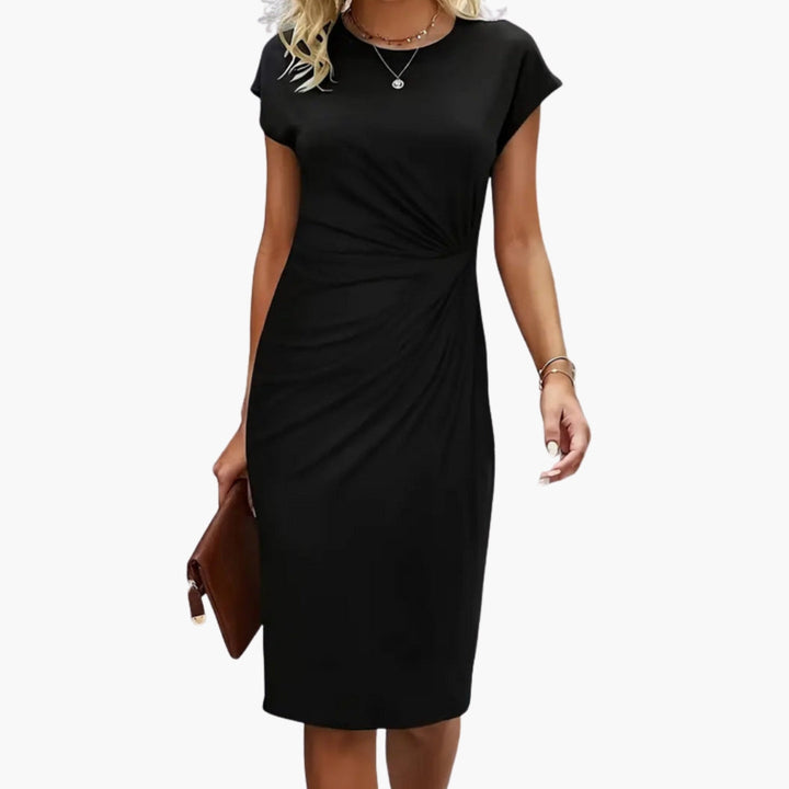 Elegant women's midi dress with a flattering round neckline & defined waist, perfect for versatile summer wear.