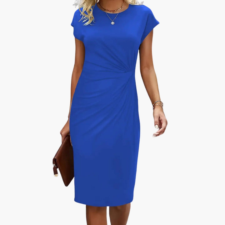 Versatile women's midi dress with a flattering round neckline & defined waist for stylish casual wear.