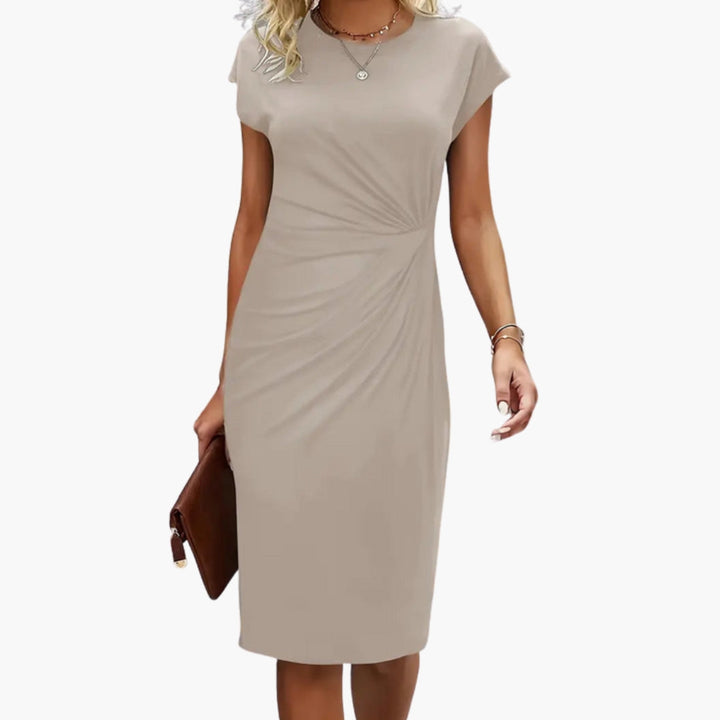 Stylish women's midi dress, designed with a flattering round neckline & a defined waist for a perfect fit.
