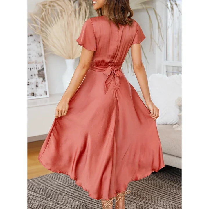 Green sophisticated midi dress for women, a timeless piece for elegant evenings or versatile daytime fashion.