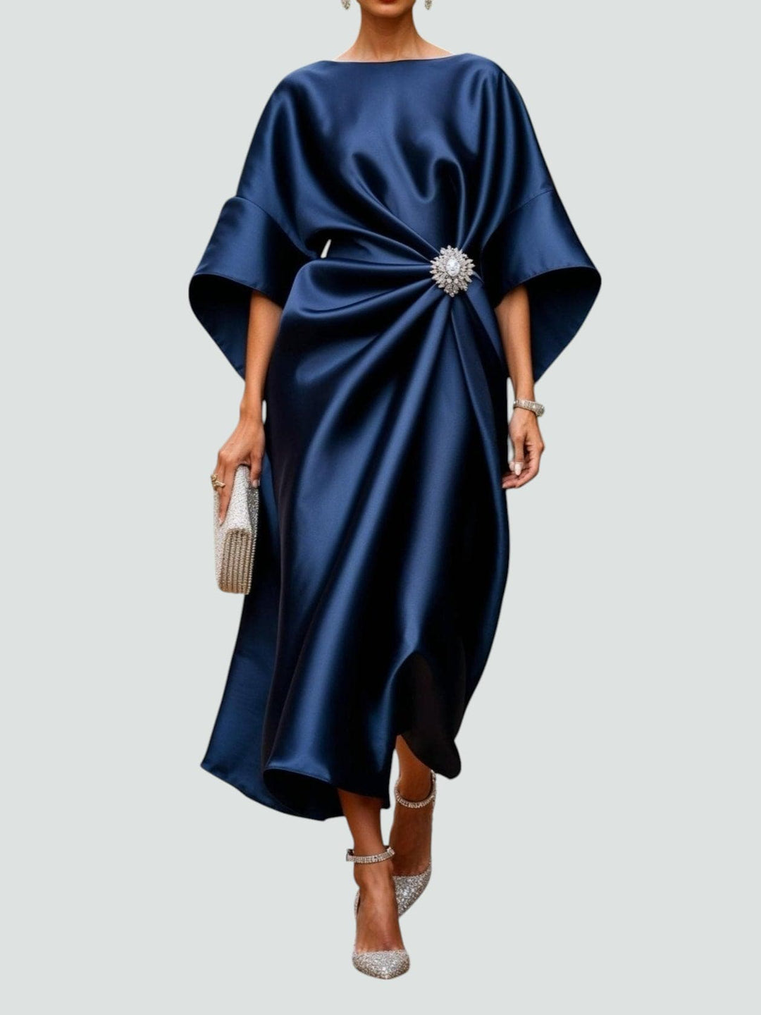 Elegant women's midi dress with a stylish brooch accent, perfect for formal occasions & evening wear.