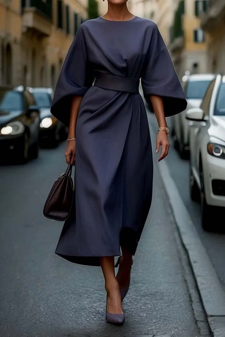 Sophisticated women's belted midi dress with stylish lantern sleeves. Perfect for fashion-forward elegance.