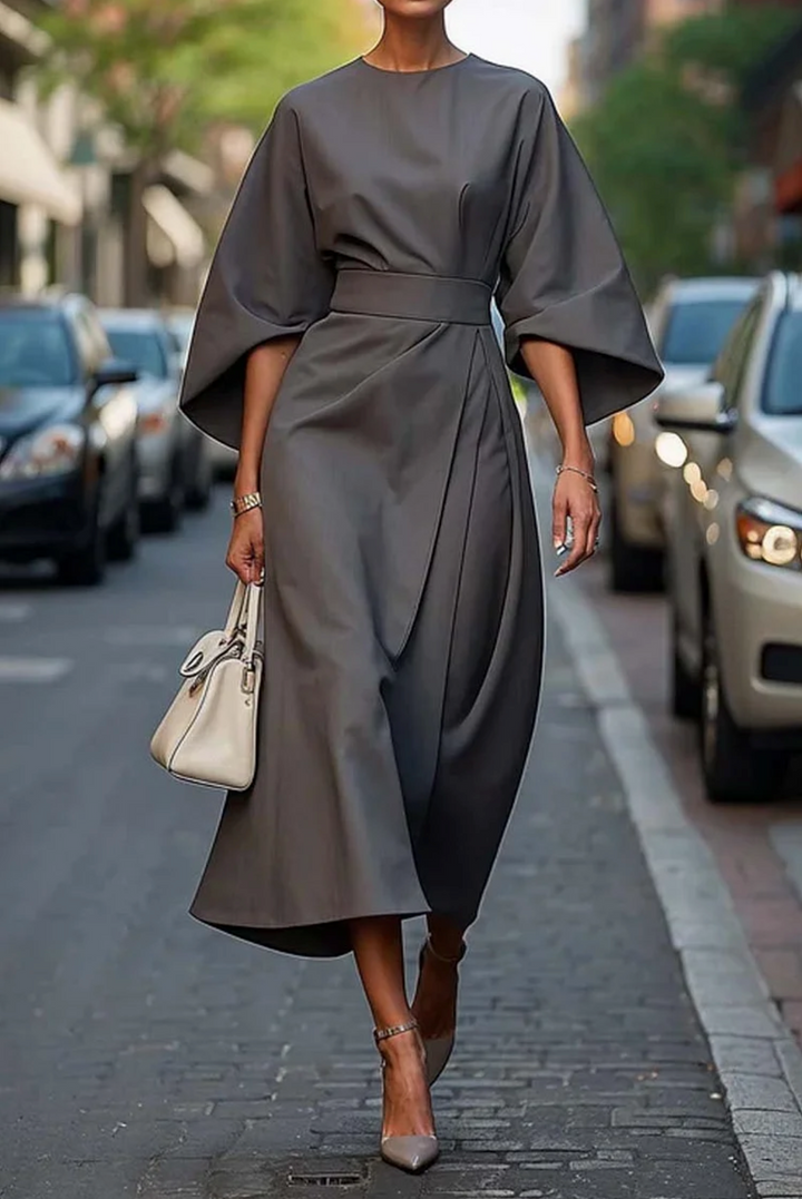 Versatile women's belted midi dress featuring elegant lantern sleeves. Perfect for casual comfort or formal style.