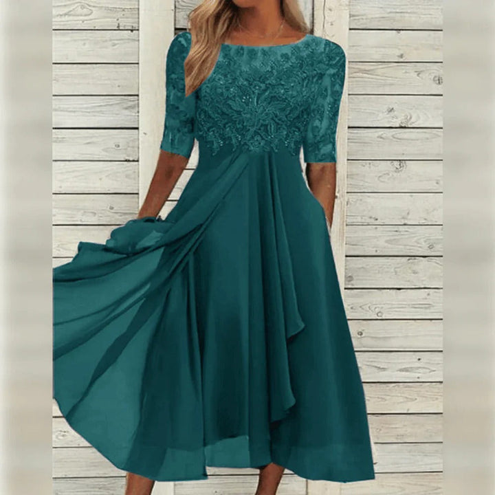 Elegant women's A-line midi dress with lace, 3/4 sleeves & a flowing skirt. Ideal for formal wear & parties.