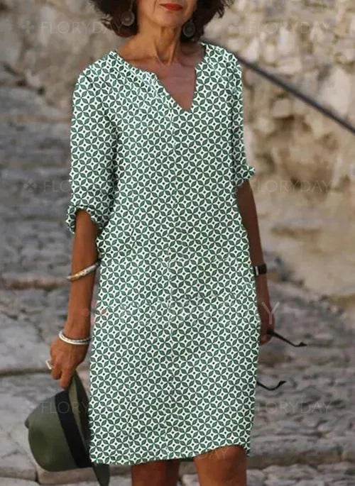 Elegant women's midi dress with long sleeves, perfect for formal or casual chic occasions. Timeless style, comfortable.