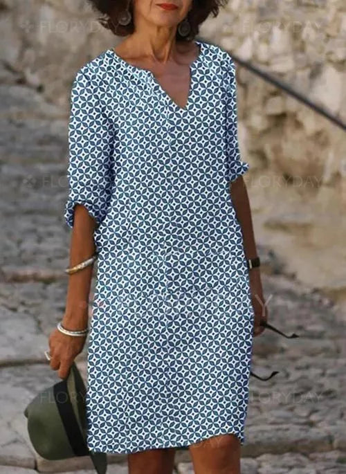 Chic women's elegant midi dress. Versatile long sleeve design, ideal for a refined formal or casual look.