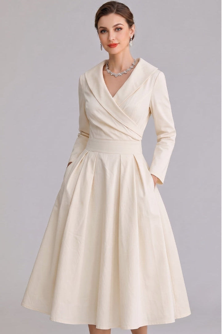 Elegant women's midi dress with pockets, perfect for versatile styling from casual to formal events.