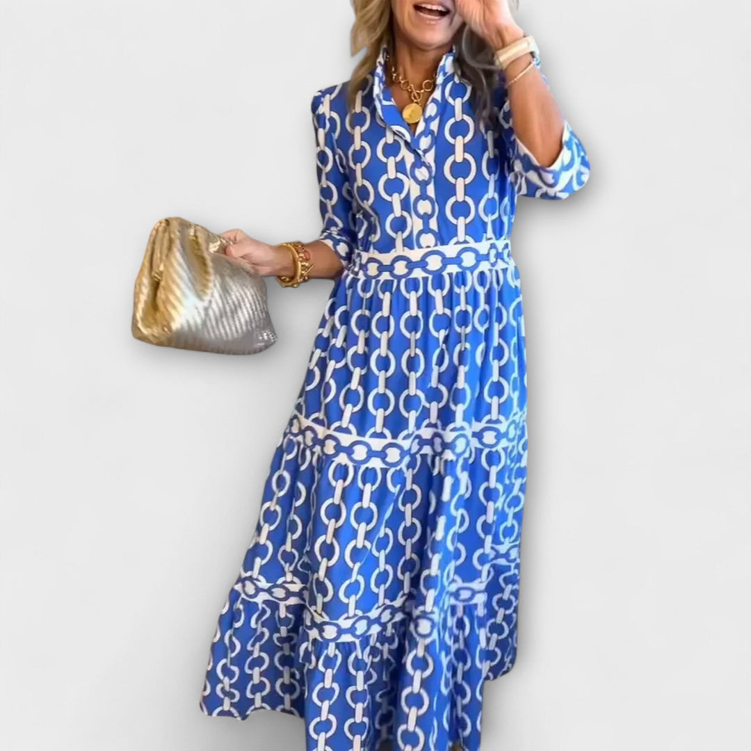 Elegant women's midi summer dress with unique chain pattern & tiered skirt. Perfect for versatile summer fashion.