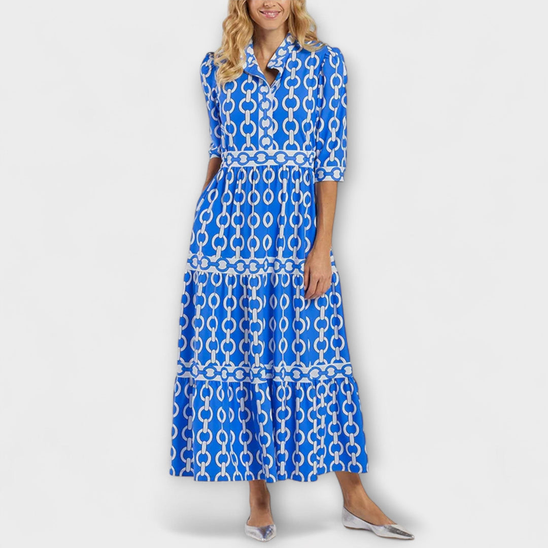 Versatile women's midi dress for summer, featuring an elegant chain pattern and stylish tiered skirt. Occasion wear.