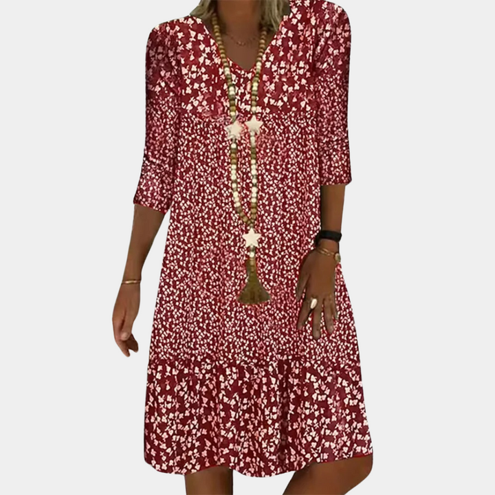 Comfortable V-neck midi summer dress for women, short sleeve, combining elegance with warm weather style.