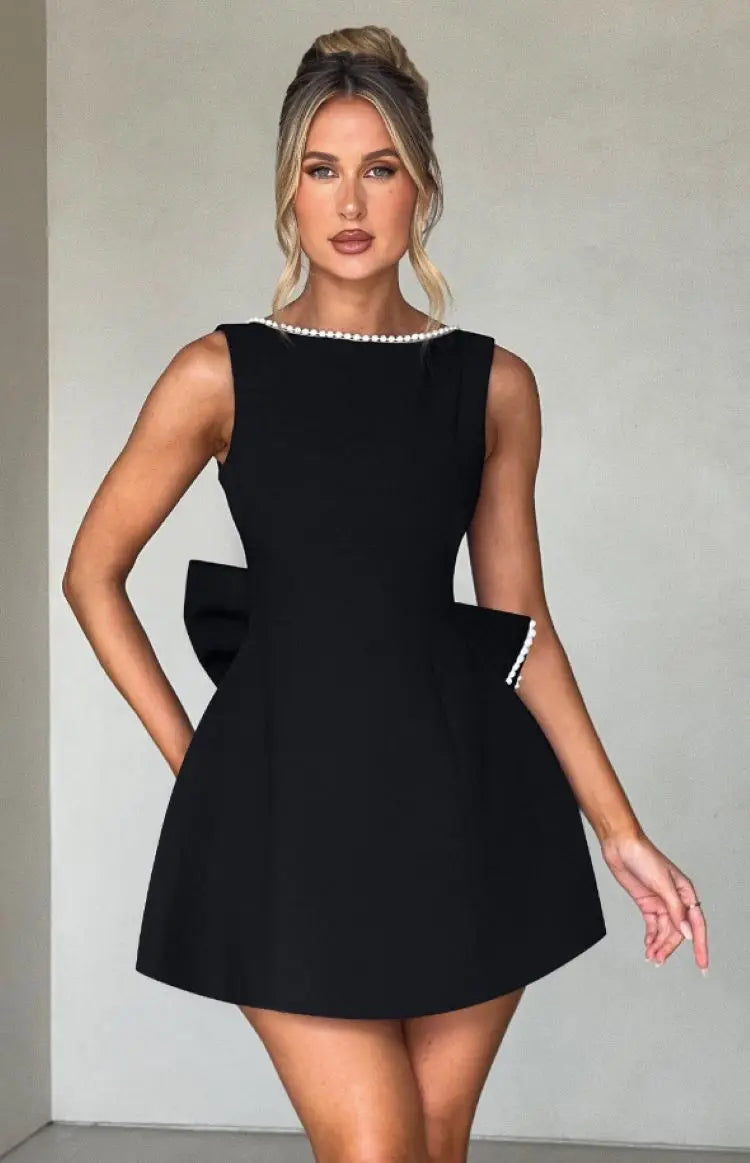 Elegant women's mini dress with a flattering silhouette, perfect for parties and cocktail events.