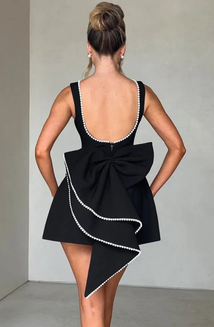 Chic mini dress for women, designed with a flattering fit, versatile for fashion-forward occasions.