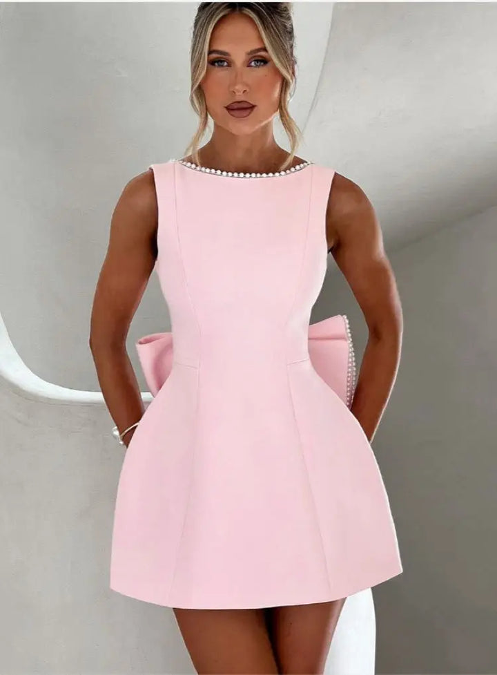 Flattering women's mini dress in a versatile elegant design, ideal for various parties & events.