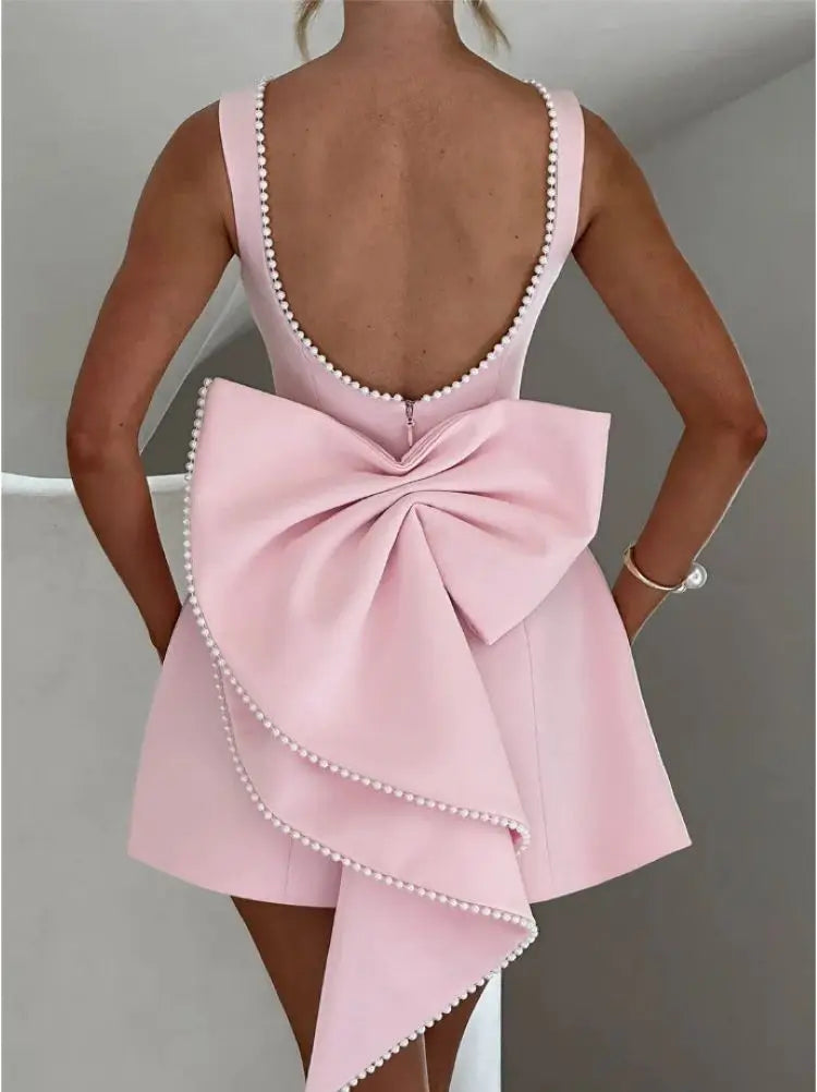 Women's elegant mini party dress, designed to create a flattering silhouette for any fashionable event.
