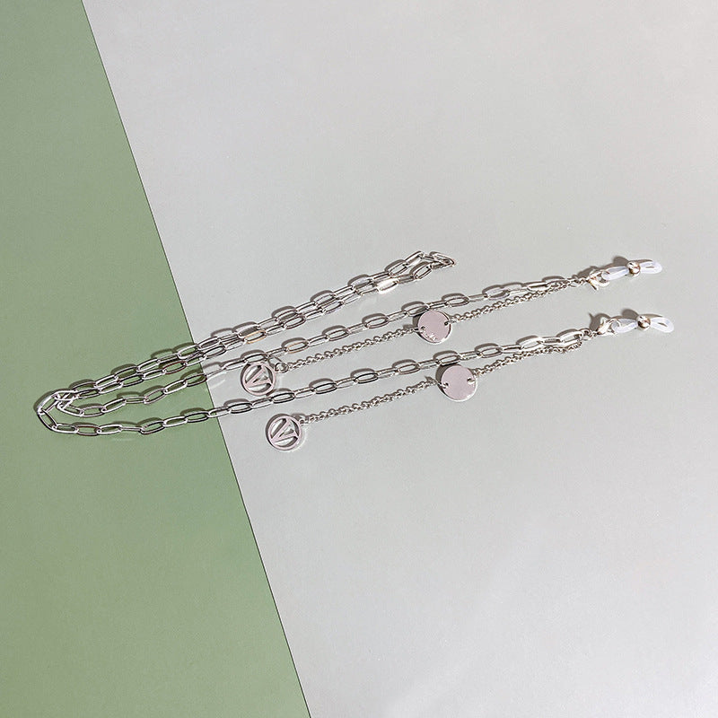 Silver tone women's pendant necklace, chic and modern fashion jewelry with a clean design.