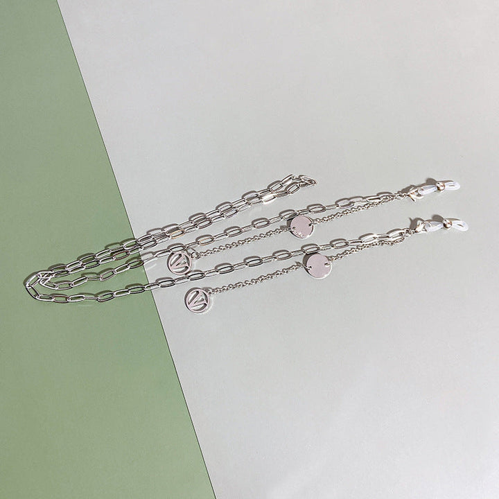 Silver tone women's pendant necklace, chic and modern fashion jewelry with a clean design.