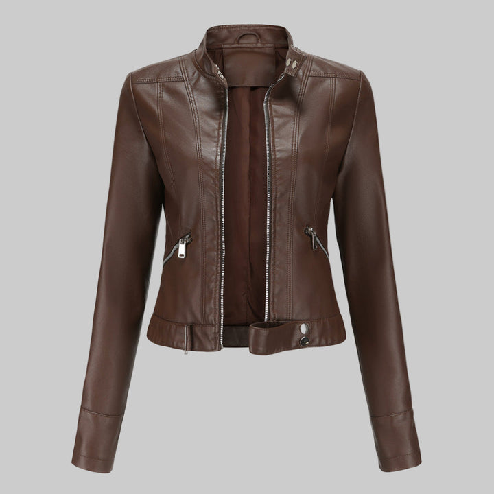 Chic women's moto biker jacket featuring a stand collar and functional zipper. Elegant outerwear for any season.