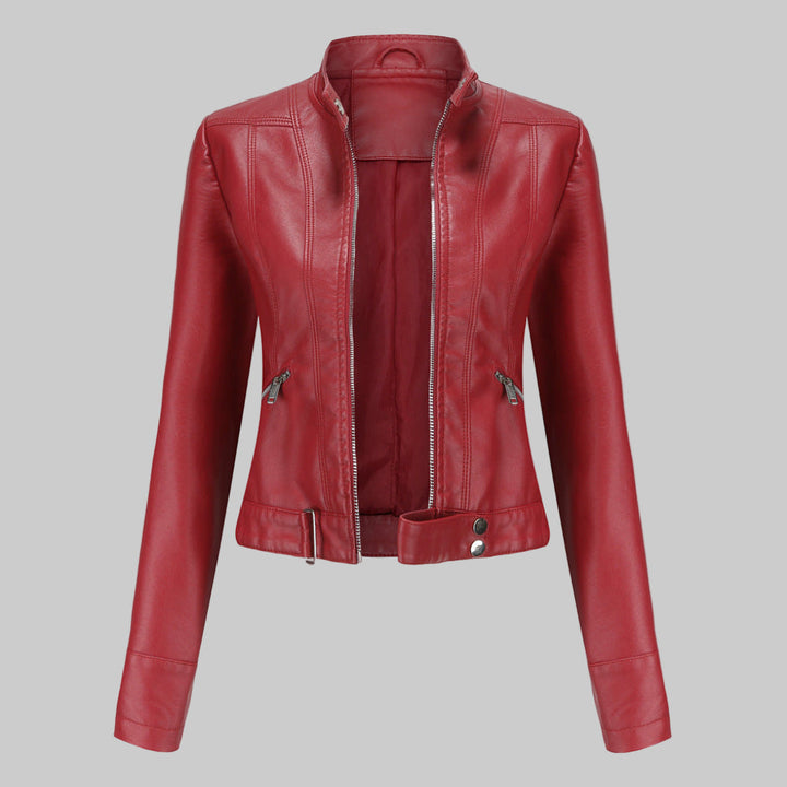 Women's elegant moto biker jacket with a sleek design, stand collar, and zipper. Versatile ladies' fashion.