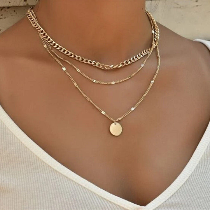 Elegant women's multi-layered chain necklace in gold or white. Adjustable & versatile fashion jewelry for her.
