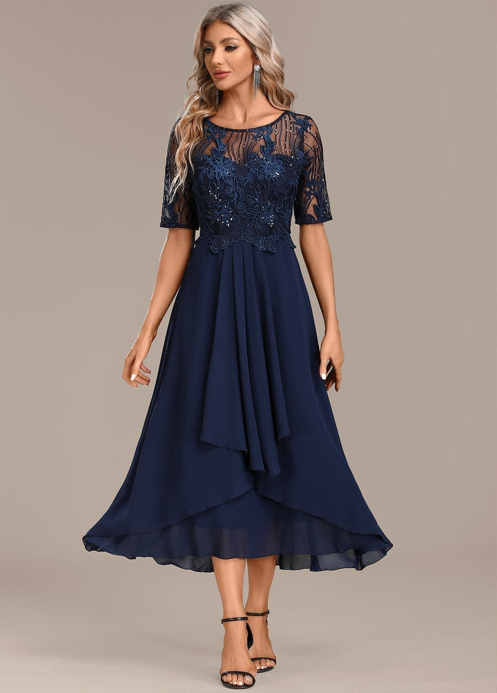 Elegant women's navy midi dress with intricate bodice design, perfect for special occasions & cocktail parties.