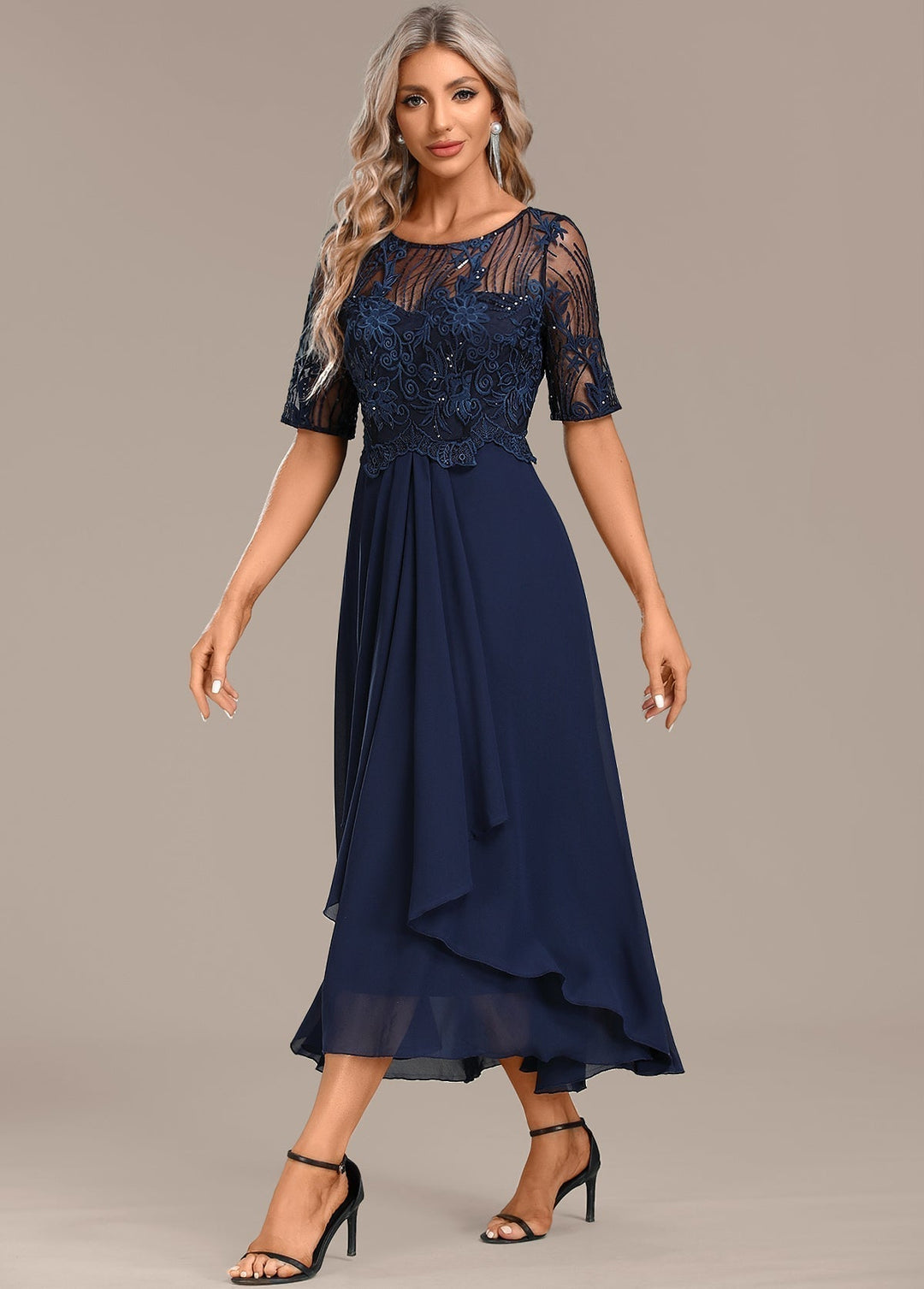 Sophisticated women's navy midi dress, flattering fit with short sleeves & a round neck, ideal for parties.