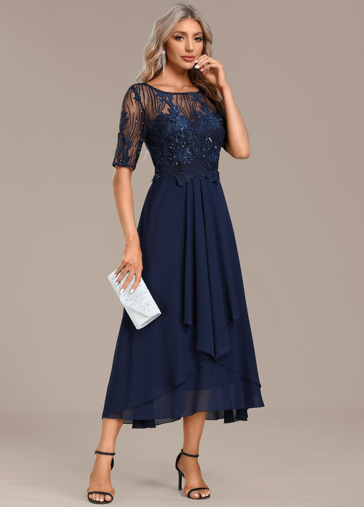 Stylish women's elegant navy midi dress, a sophisticated party dress with a flattering cut.