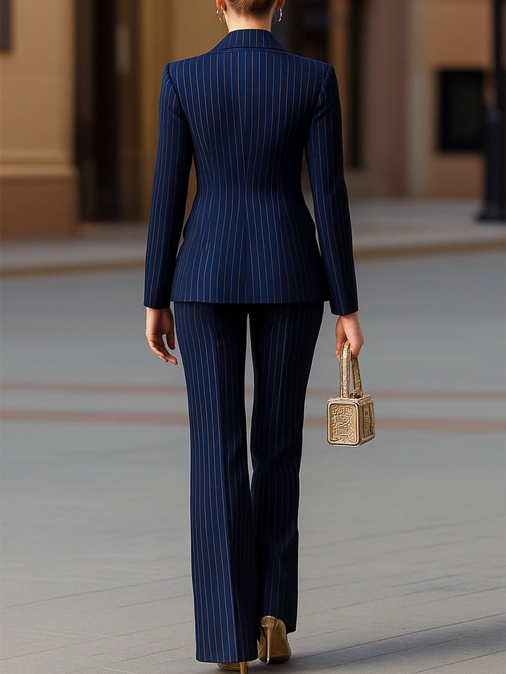 Chic black pinstripe women's suit set, featuring an elegant blazer and tailored trousers for work.